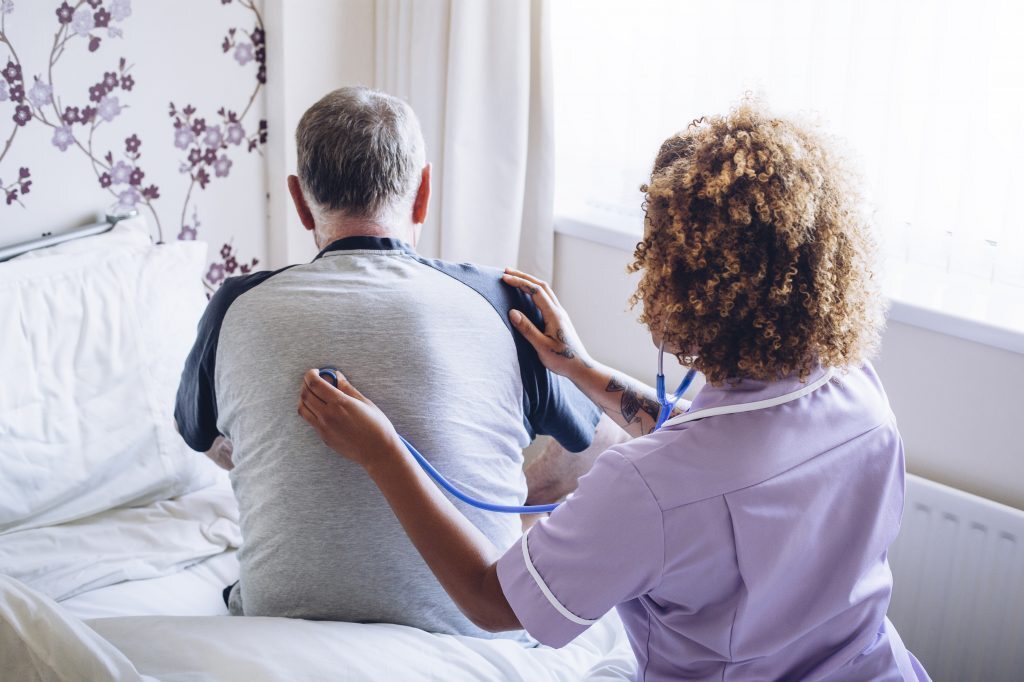 Senior man receiving medical exam