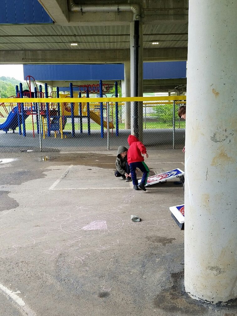 Kids playing at community field day