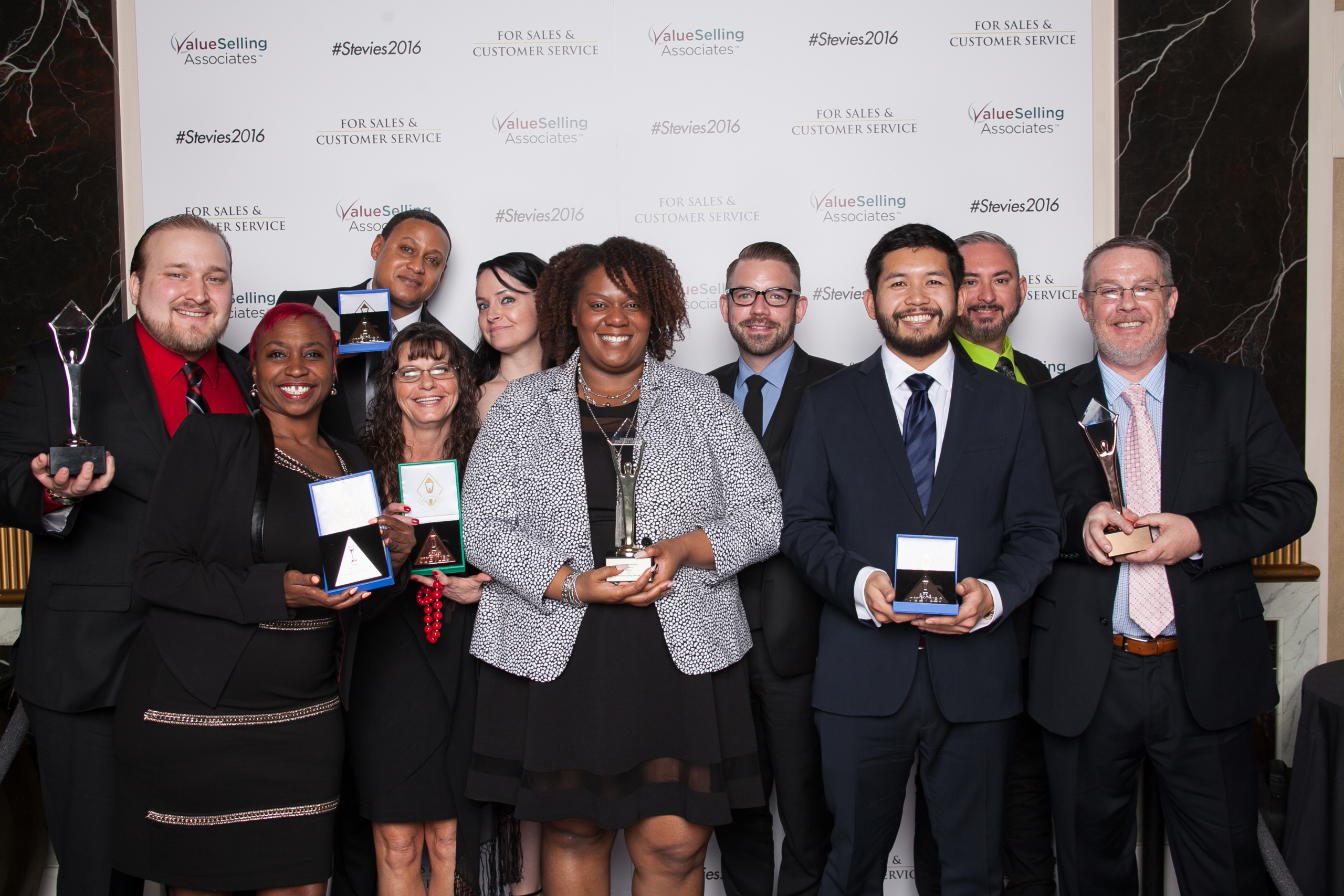 MTM Health training team with awards
