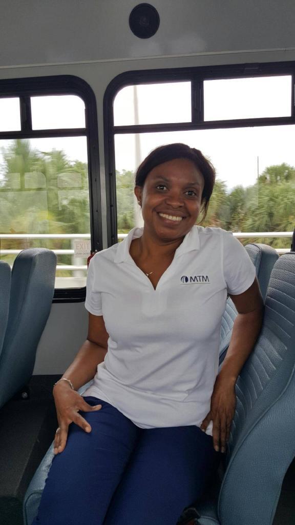 MTM team member riding the bus in Florida