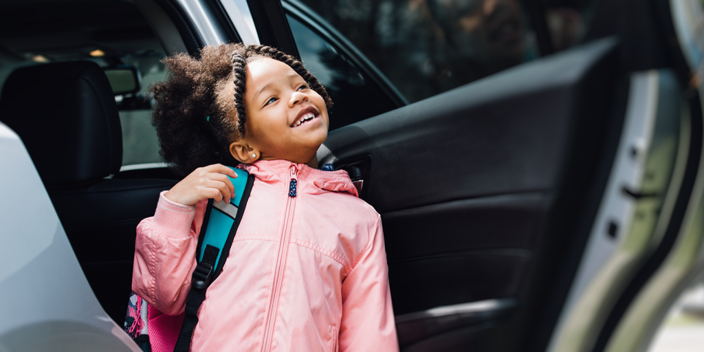 Child getting into a car