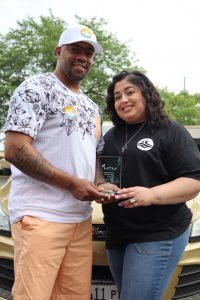 Delvin and Brisa Dixon, owners of Seabreeze, pose with their Transportation Hero award.