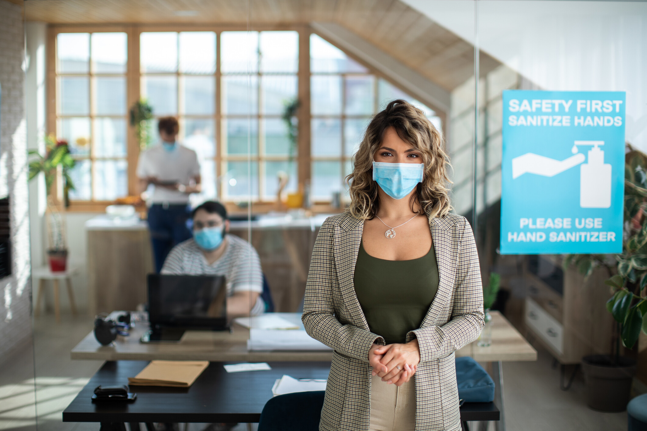A woman stands in a work office wearing a face covering. MTM Health takes the health and safety of our teammates and visitors seriously. To prevent the spread of COVID-19 and ensure our employees and visitors remain healthy, we have adopted strict COVID-19 protocol at our headquarters.
