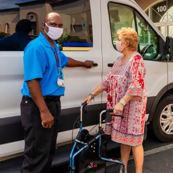 Driver opening door for a passenger with a walker