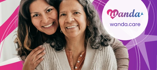 Mother and daughter smiling at the camera with the Wanda logo on the right